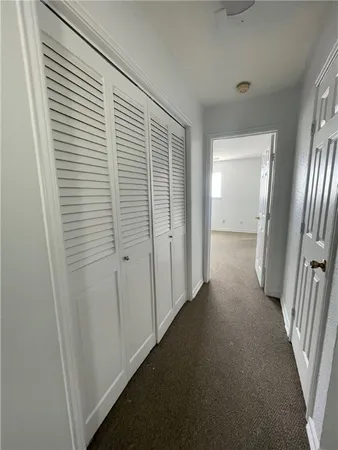 a view of a room that has a window in it