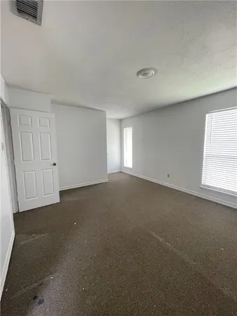 a view of a room with racks on the wall