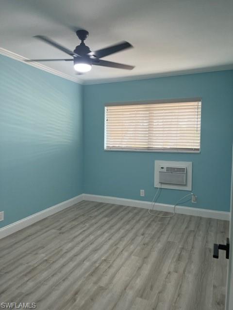 473 12th Avenue South, Unit B2 Naples, FL 34102 - Photo 18 of 23 an empty room with a window