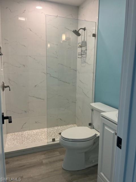 473 12th Avenue South, Unit B2 Naples, FL 34102 - Photo 19 of 23 a bathroom with a toilet and a shower