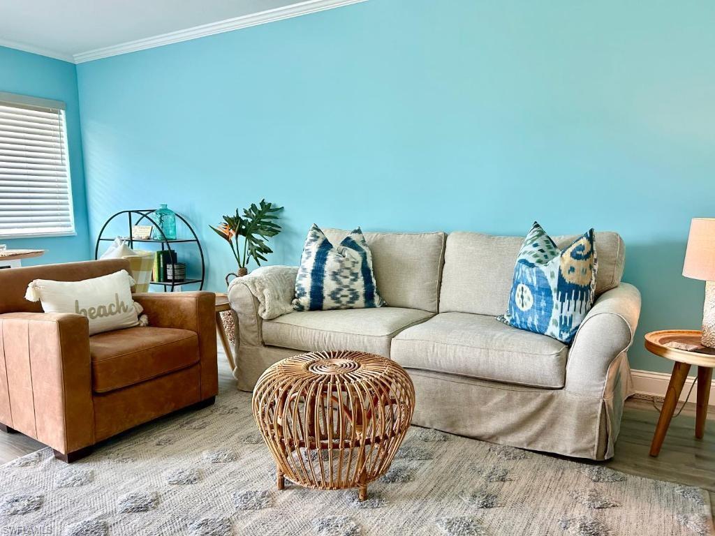 473 12th Avenue South, Unit B2 Naples, FL 34102 - Photo 8 of 23 a living room with furniture