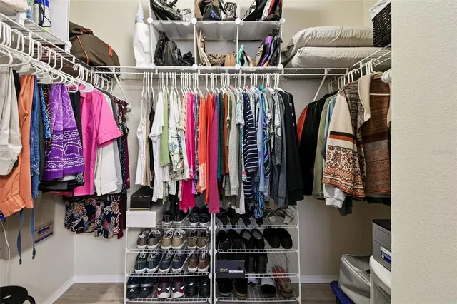 a view of a balcony with two chairs