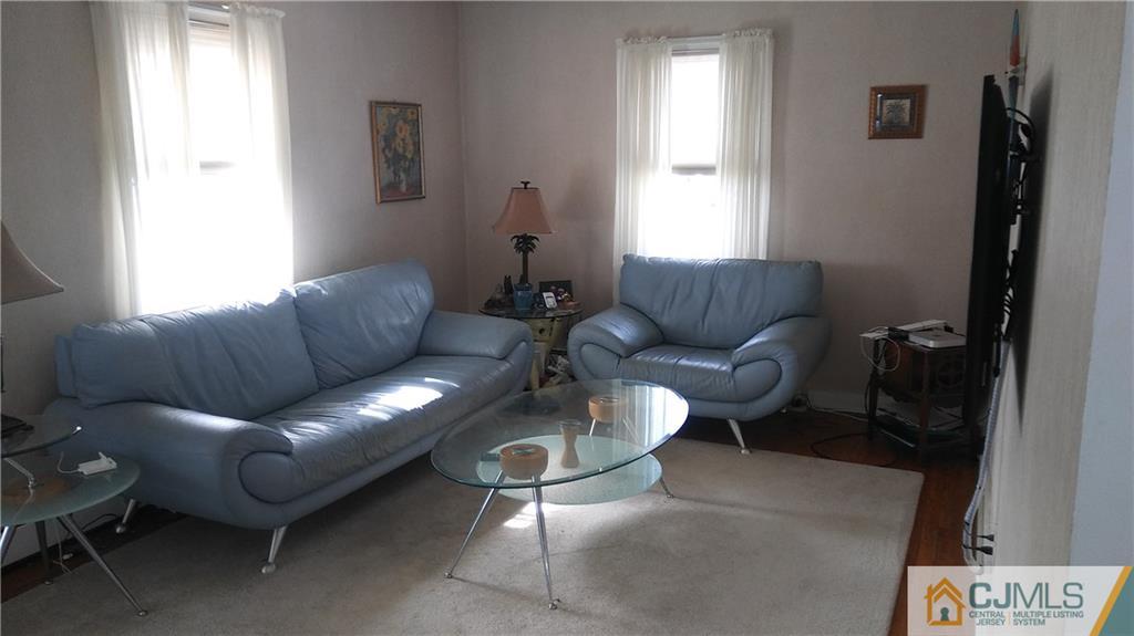 522 Crows Mill Road Fords, NJ 08863 - Photo 6 of 14 a living room with furniture and a window