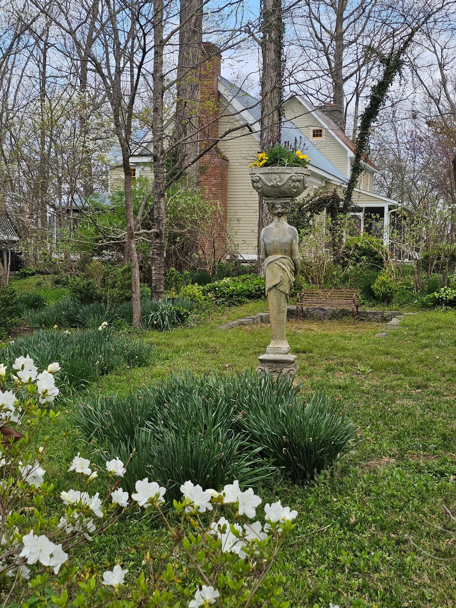 5180 Fire Tower Road Franklin, TN 37064 - Photo 10 of 99 a front view of a house with a yard and fountain in middle