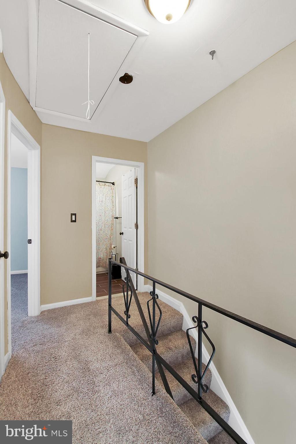 9724 Matzon Road Baltimore, MD 21220 - Photo 10 of 26 Pull down attic for additional storage space