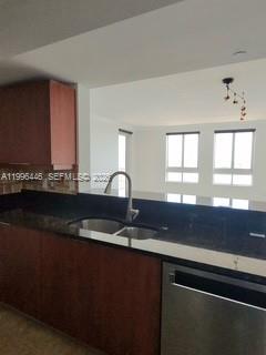 7350 Southwest 89th Street, Unit 1102S Miami, FL 33156 - Photo 14 of 30 a view of a kitchen counter space and windows