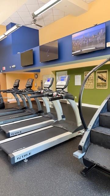 7350 Southwest 89th Street, Unit 1102S Miami, FL 33156 - Photo 23 of 30 a view of a room with gym equipment
