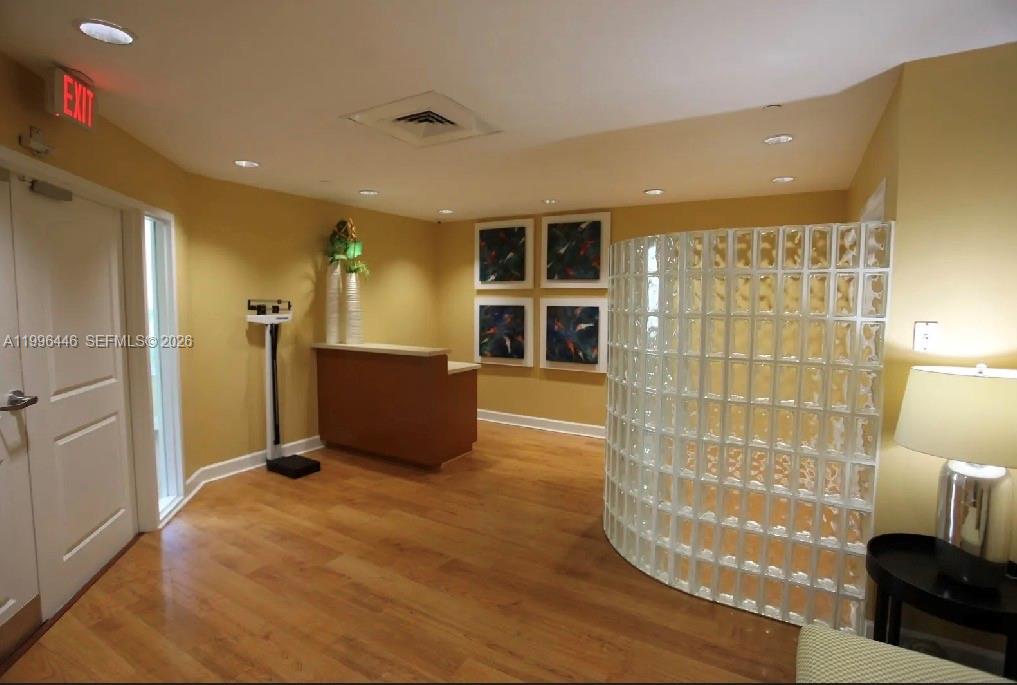 7350 Southwest 89th Street, Unit 1102S Miami, FL 33156 - Photo 29 of 30 a view of livingroom with furniture and an entrance to other room