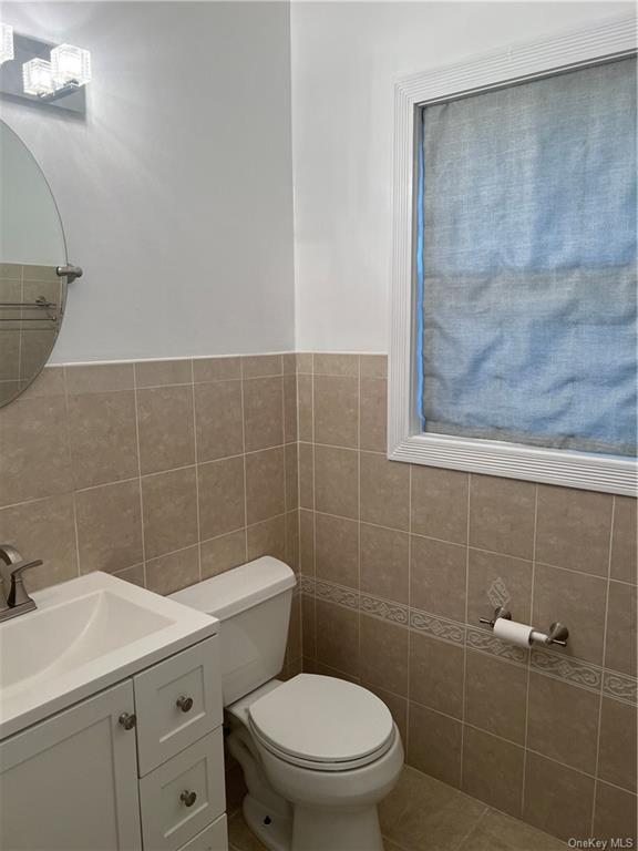 240-250 Pelham Road New Rochelle, NY 10805 - Photo 11 of 36 This is a half bath/powder room. It's right on the main level. So, it's convenient for your guests!