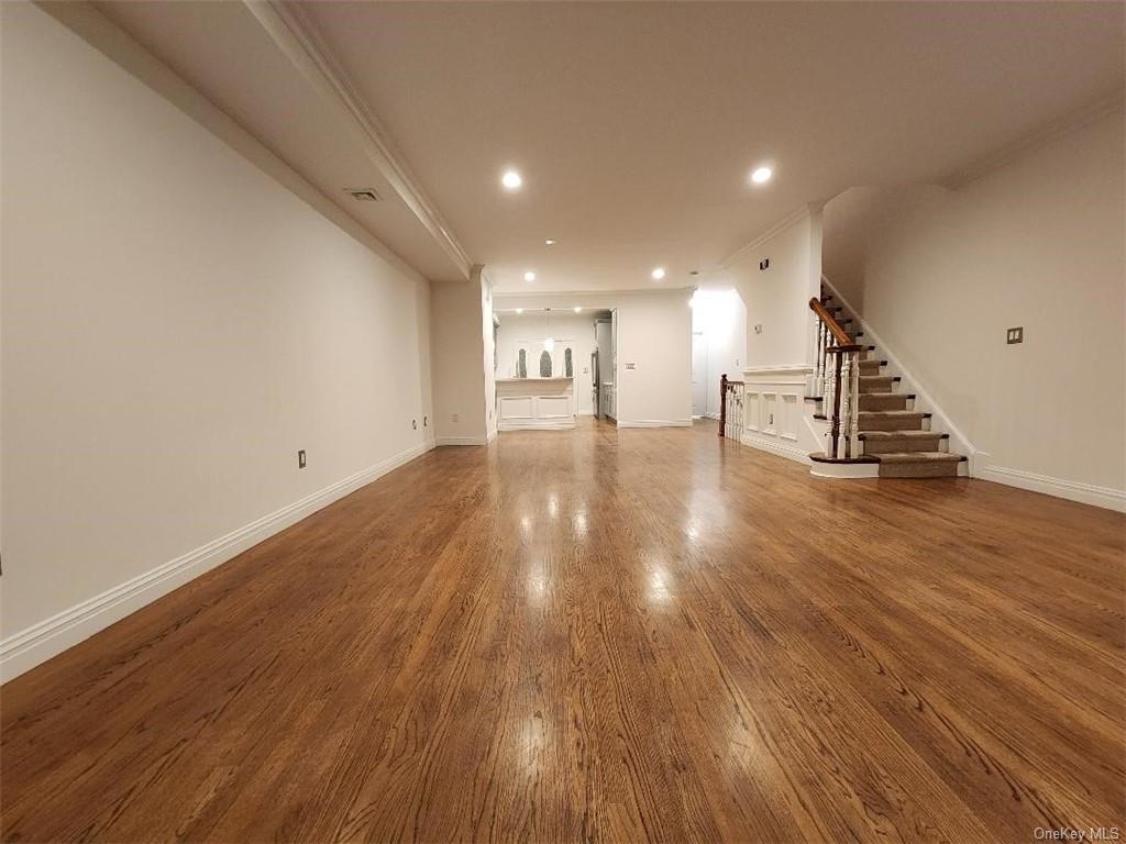 240-250 Pelham Road New Rochelle, NY 10805 - Photo 12 of 36 Amazing cavernous Living Room and Dining Room! These floors are absolutely stunning!
