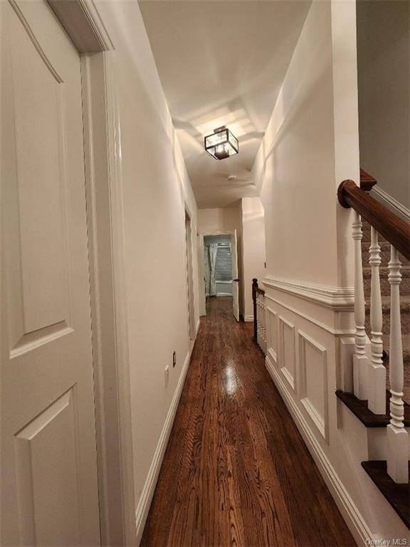 240-250 Pelham Road New Rochelle, NY 10805 - Photo 15 of 36 This is a view of the 3rd Floor Hallway, with entrances to 3 bedrooms, hall bath and staircase up to 4th floor. Notice the gorgeous hardwood flooring and picture frame moulding
