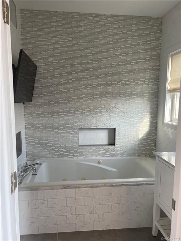 240-250 Pelham Road New Rochelle, NY 10805 - Photo 20 of 36 You'll be amazed at this large, whirlpool tub! Settle into a nice warm bath, while you watch your favorite tv shows!