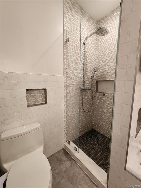 240-250 Pelham Road New Rochelle, NY 10805 - Photo 21 of 36 Master Ensuite Separate Shower Stall with luxurious ceramic tiles. Toilet with bidet.