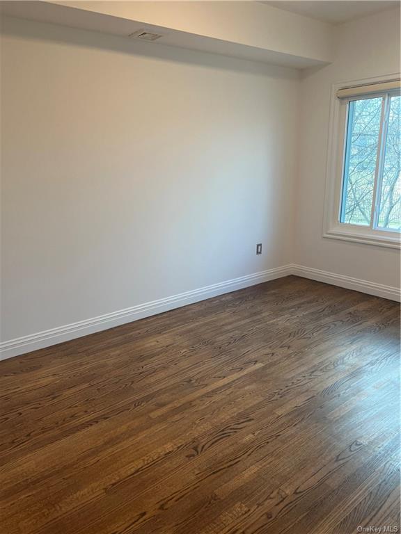 240-250 Pelham Road New Rochelle, NY 10805 - Photo 22 of 36 2nd Bedroom, featuring enough space for a full or queen size bed and hardwood flooring.
