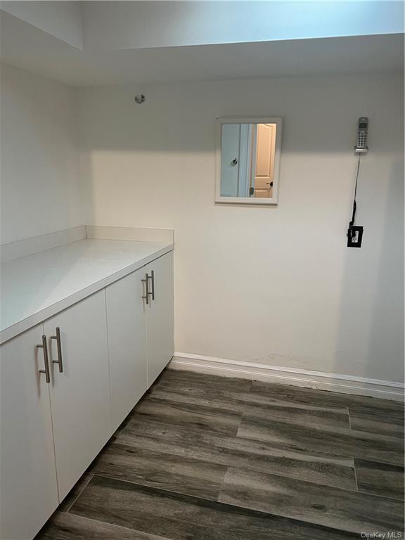 240-250 Pelham Road New Rochelle, NY 10805 - Photo 32 of 36 The Laundry room with hook ups (bring your own), folding counter and cabinetry.