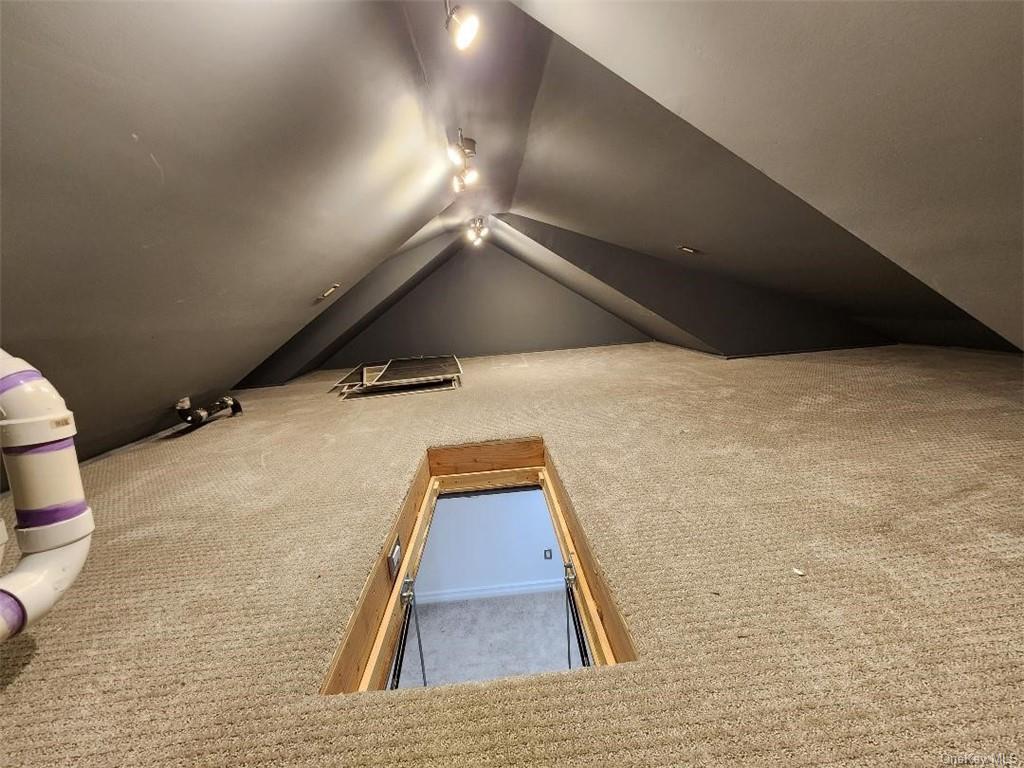 240-250 Pelham Road New Rochelle, NY 10805 - Photo 34 of 36 This area is located above the 4th Floor Finished Room. It is accessed up a pull down staircase. There is plenty of room for boxes if you need it.