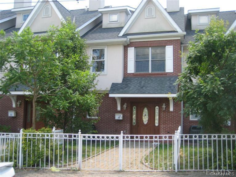 240-250 Pelham Road New Rochelle, NY 10805 - Photo 5 of 36 Front Entrance with Yard and gate.