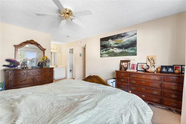 a bathroom with a double vanity sink toilet and shower