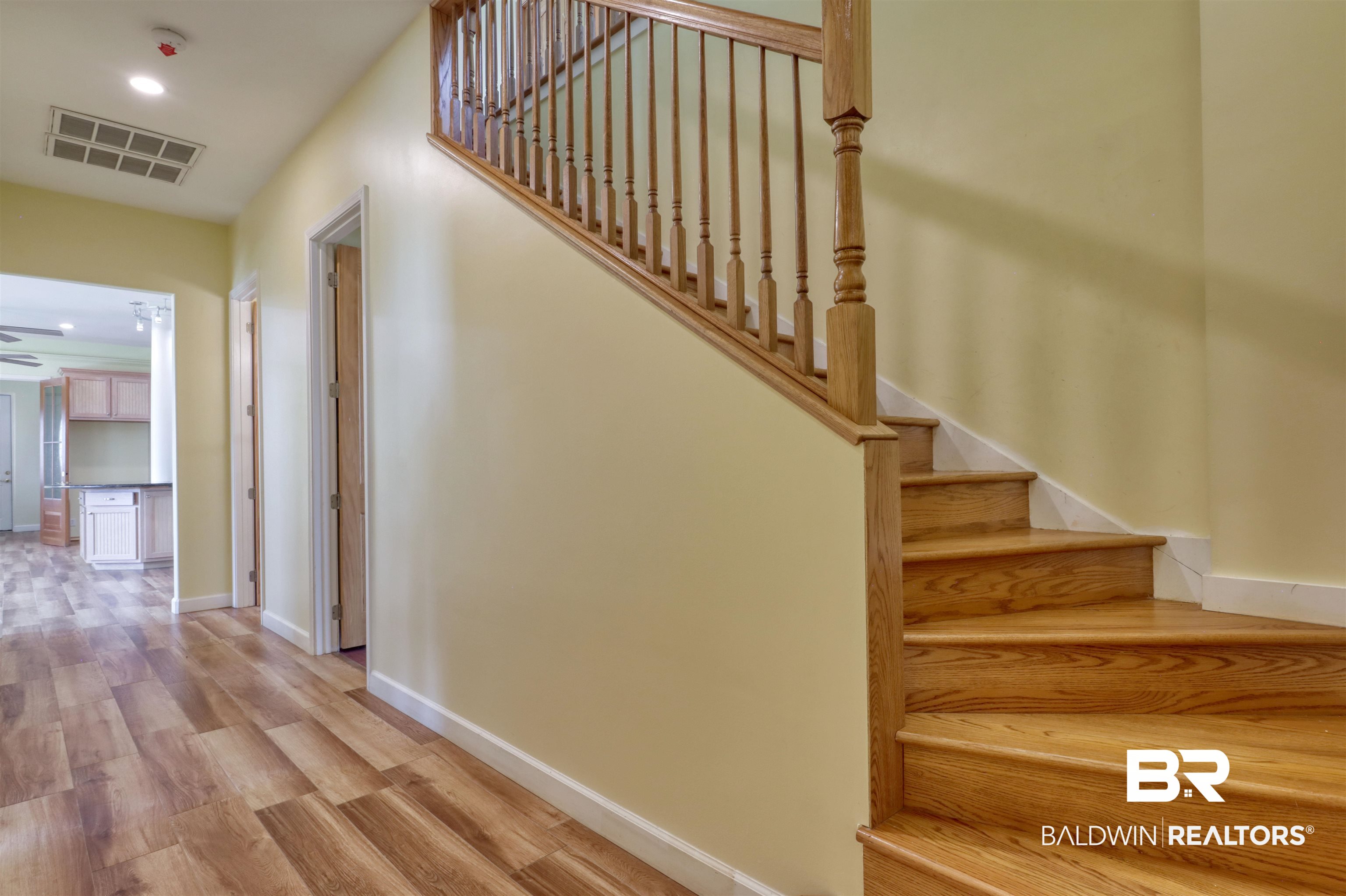 28461 Gardner Road Elberta, AL 36530 - Photo 15 of 46 Stairs featuring wood finished floors and recessed lighting