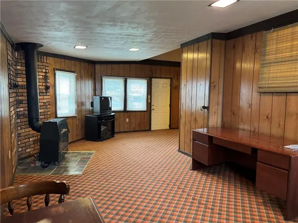 a lobby with furniture and window