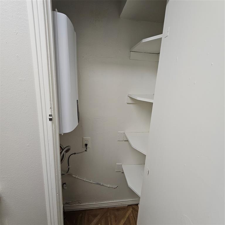 3911 Prescott Avenue Dallas, TX 75219 - Photo 9 of 18 With electric hot water heater