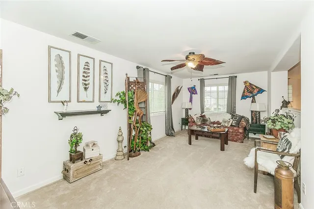 a bathroom with a granite countertop sink a mirror and shower