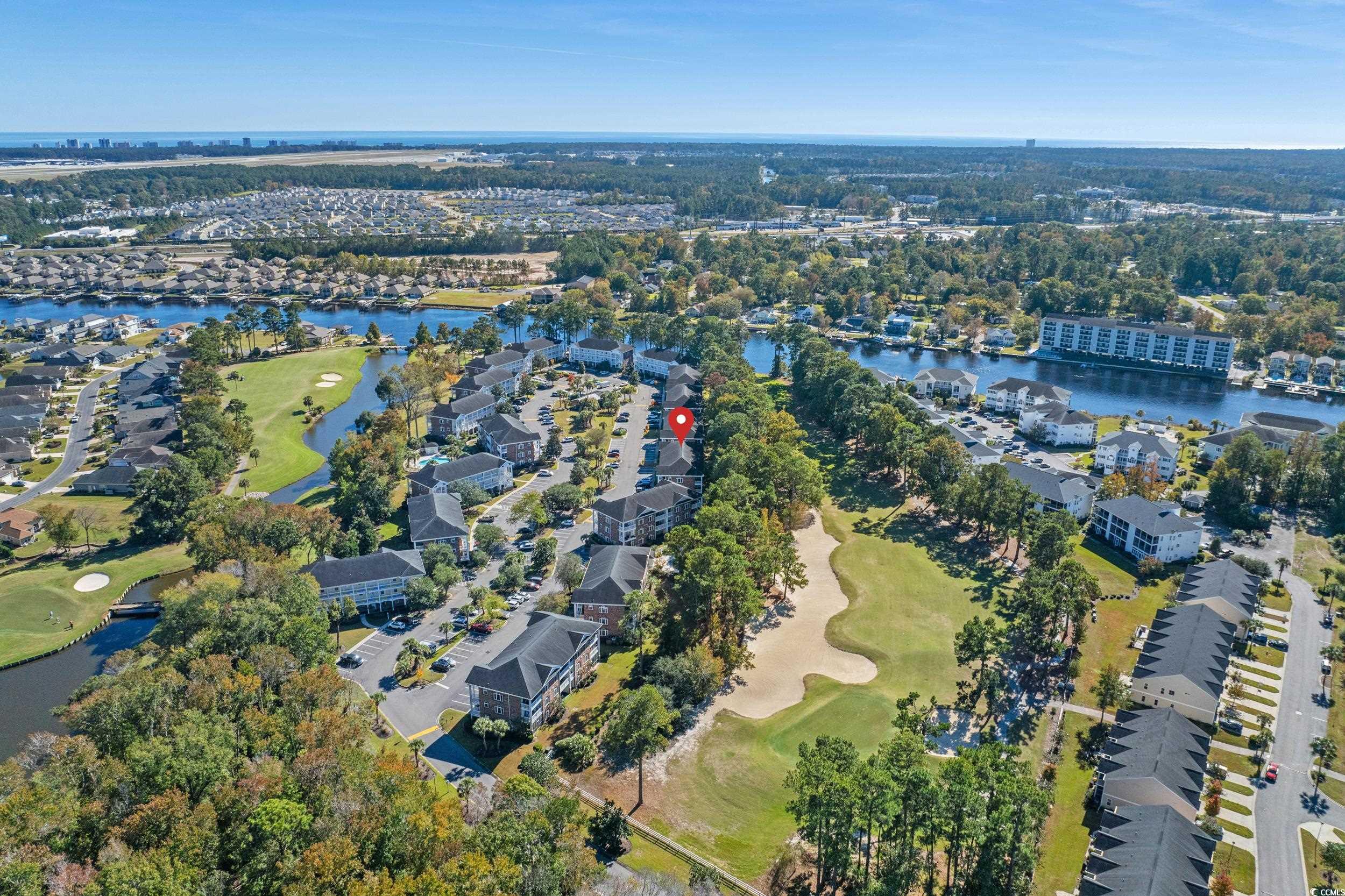 686 Riverwalk Drive, Unit 204 Myrtle Beach, SC 29579 - Photo 2 of 40 View of property location with a golf course and nearby intracoastal waterway