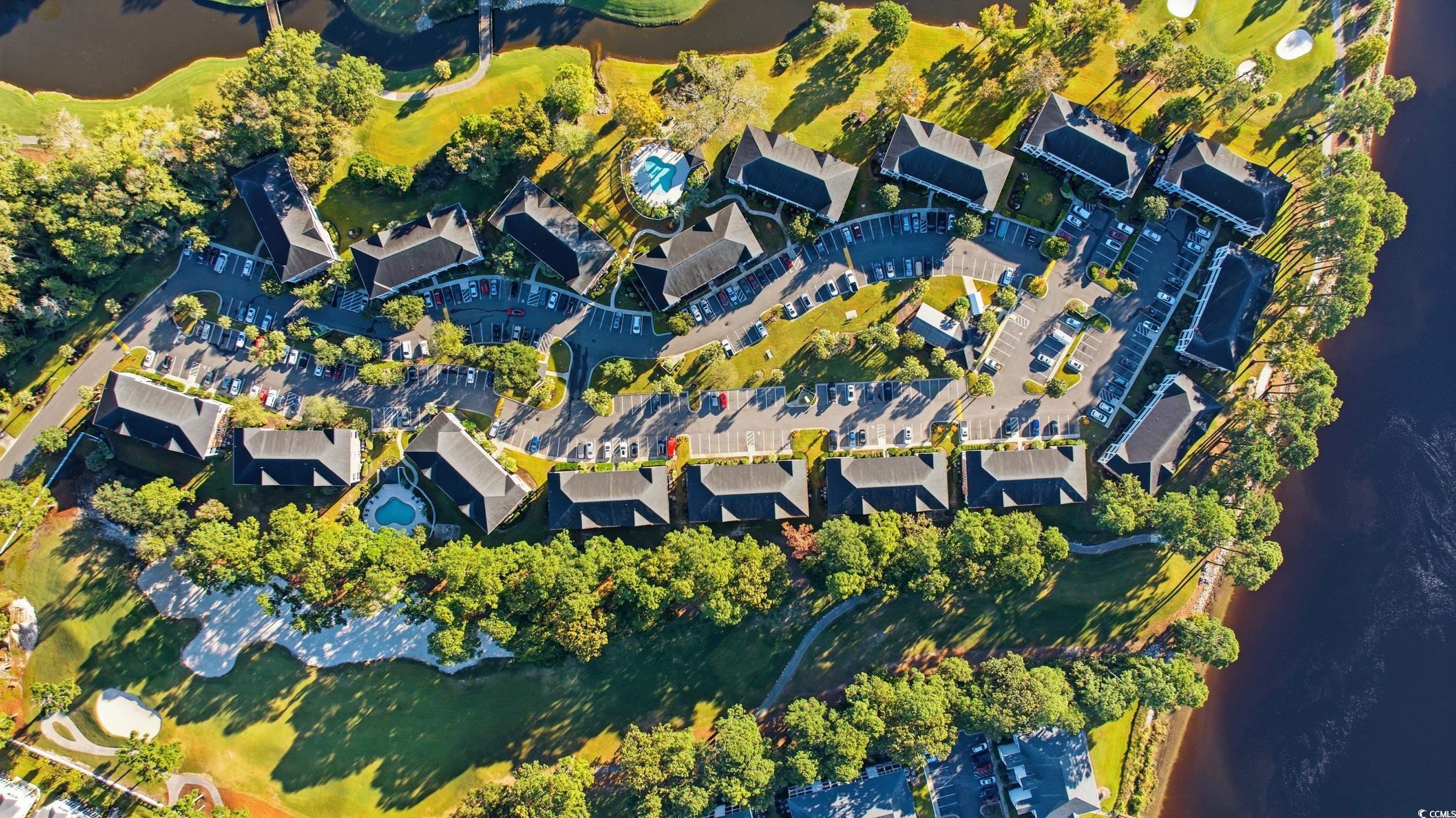 686 Riverwalk Drive, Unit 204 Myrtle Beach, SC 29579 - Photo 37 of 40 Aerial overview of property's location with a large body of water and a golf club