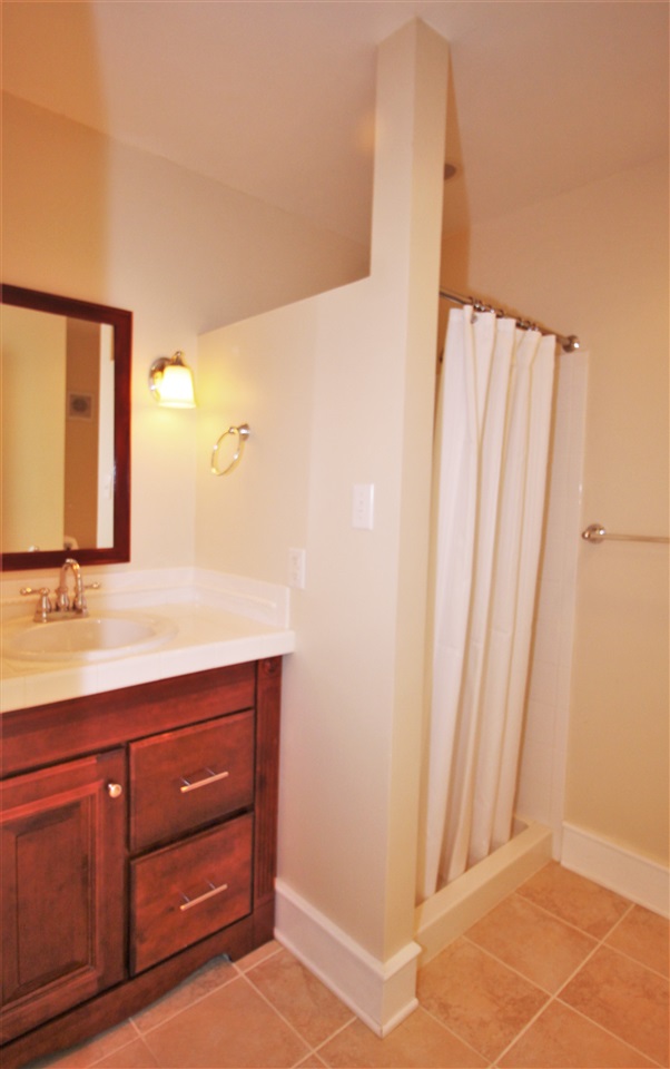 435 Baynes Road Waynesboro, VA 22980 - Photo 13 of 35 a bathroom with a sink and a mirror