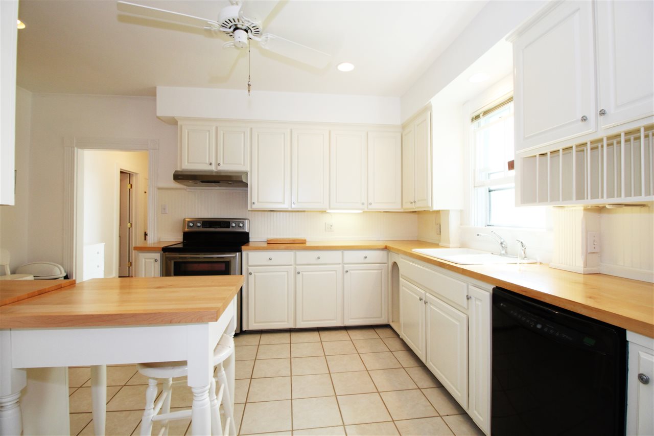 435 Baynes Road Waynesboro, VA 22980 - Photo 15 of 35 a kitchen with a sink a stove and cabinets