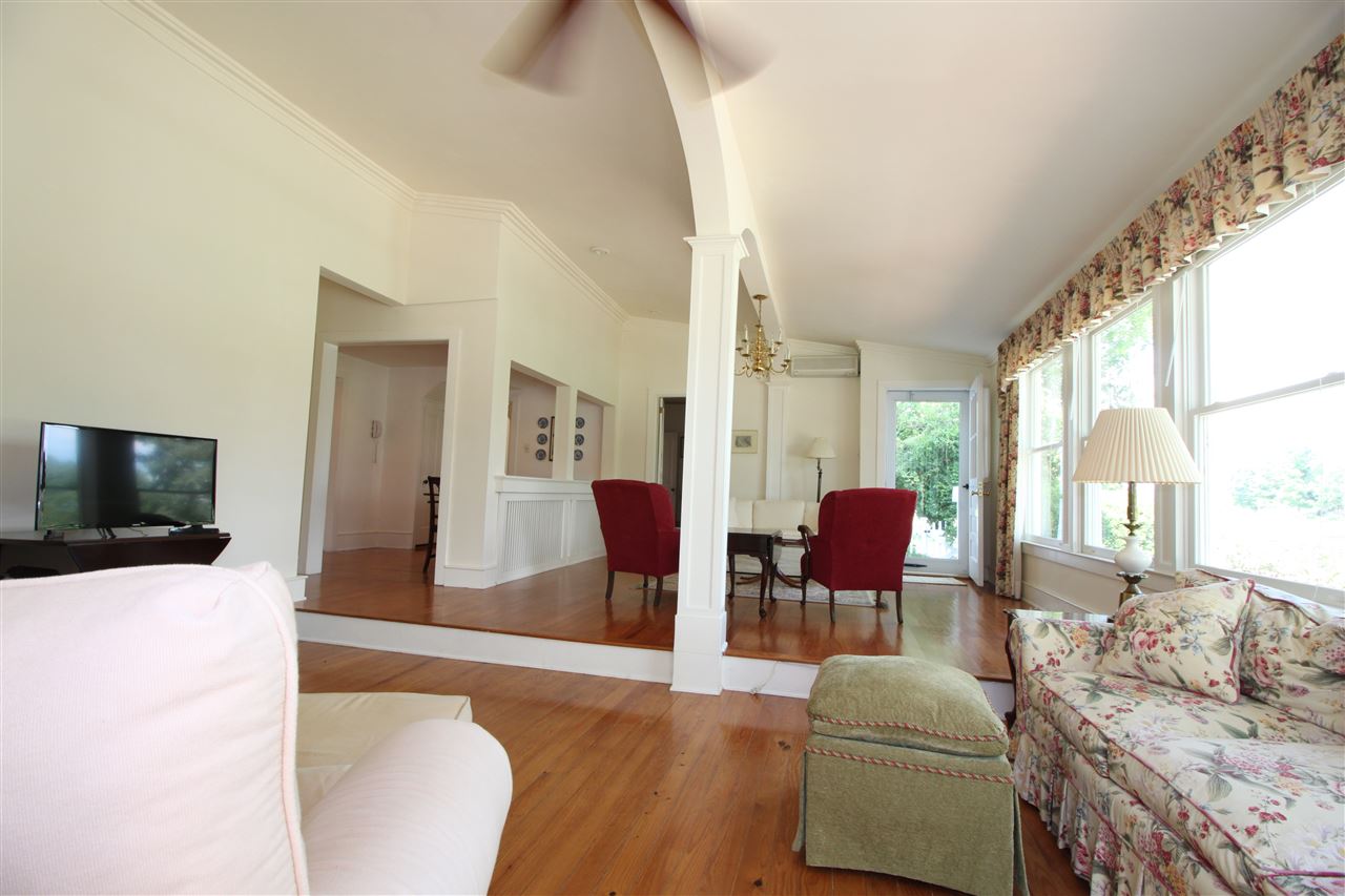 435 Baynes Road Waynesboro, VA 22980 - Photo 8 of 35 a living room with furniture wooden floor and a flat screen tv