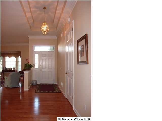 3 Kings N Road Jackson, NJ 08527 - Photo 2 of 3 a view of a hallway with wooden floor