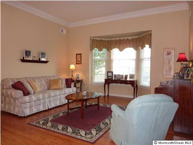 3 Kings N Road Jackson, NJ 08527 - Photo 3 of 3 a living room with furniture and a large window