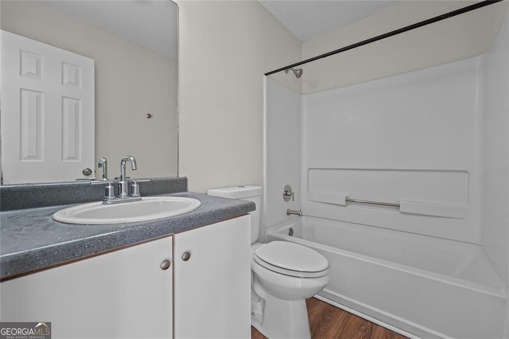 2320 Highbank Court Decatur, GA 30035 - Photo 24 of 27 a bathroom with a sink a toilet and shower