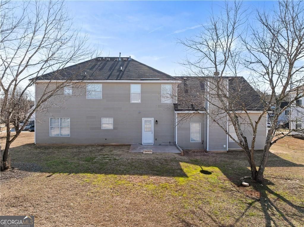 2320 Highbank Court Decatur, GA 30035 - Photo 27 of 27 a view of a house with a yard