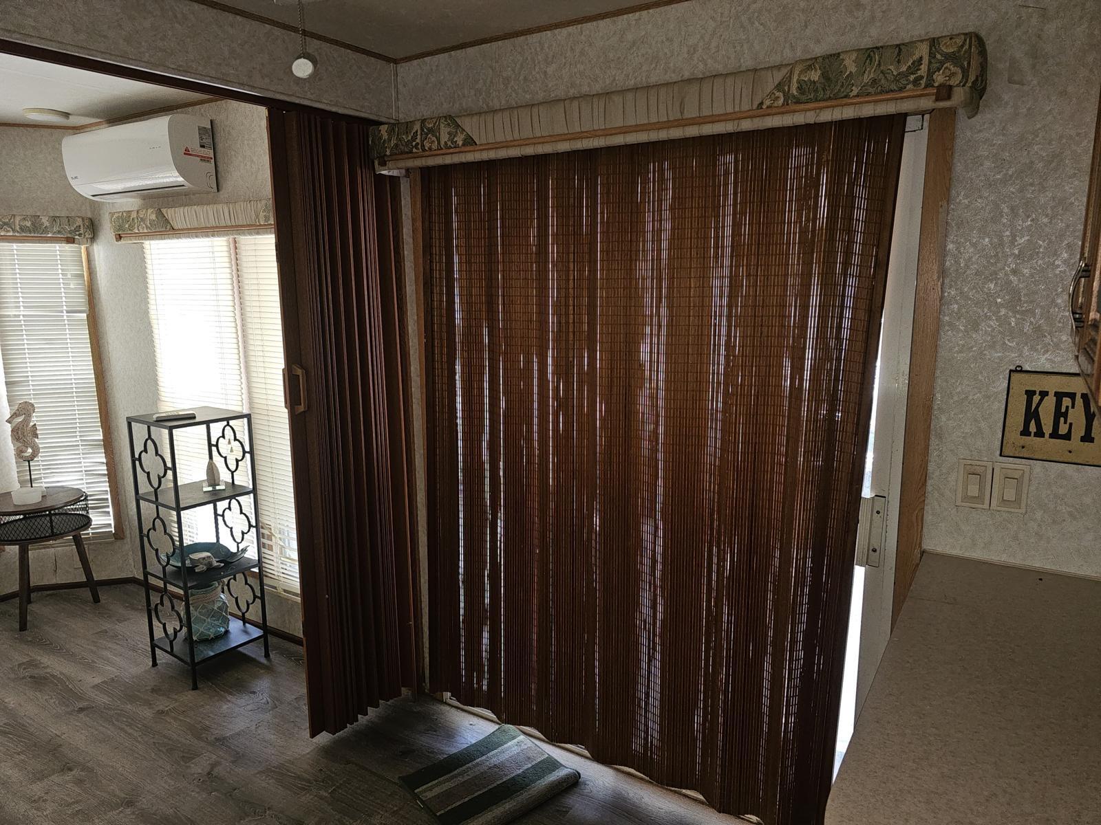 325 Calusa Street, Unit 413 Key Largo, FL 33037 - Photo 5 of 27 a view of a entryway with wooden floor and stairs