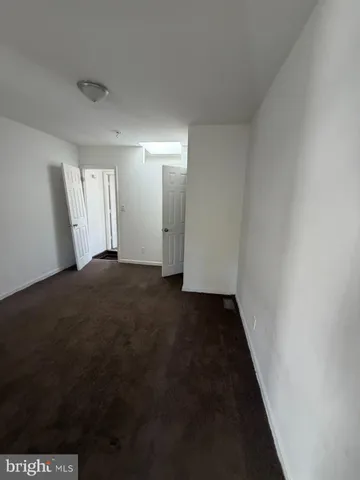a bathroom with sink and mirror