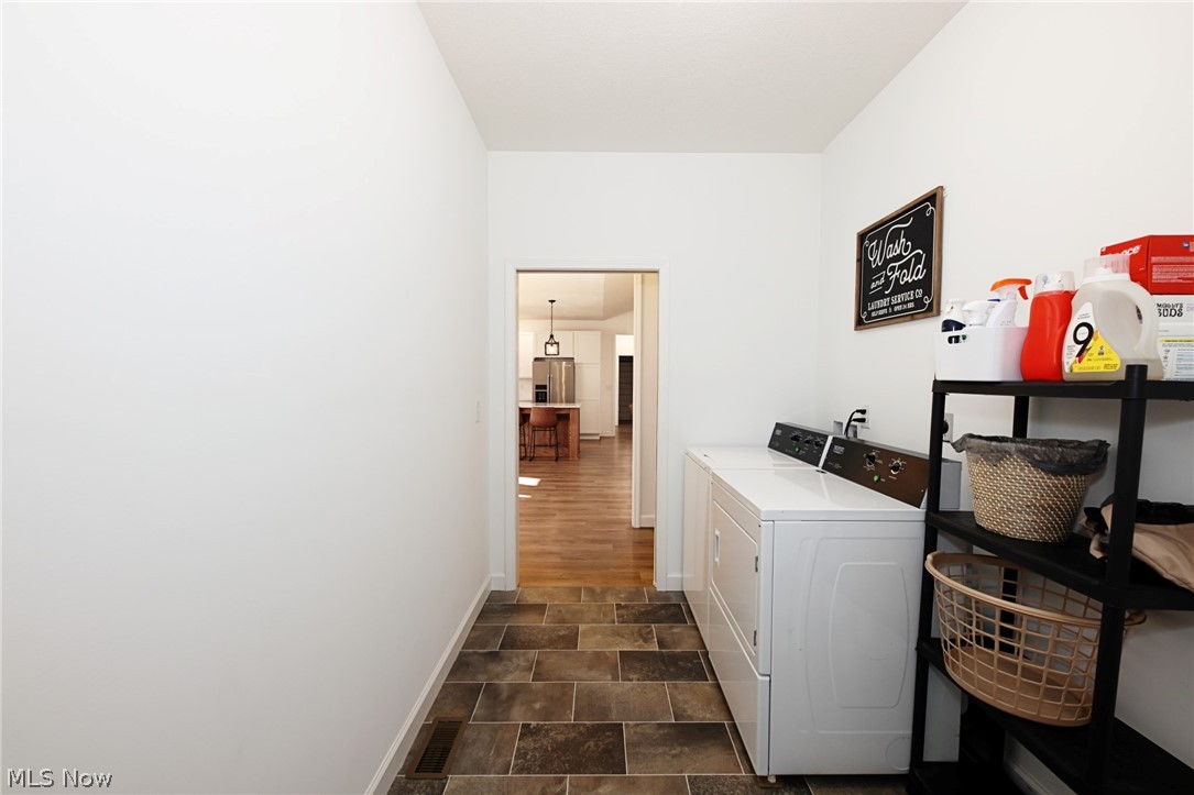 258 Friendly Acres Road Wellsburg, WV 26070 - Photo 17 of 47 Main level Laundry room with washer and dryer