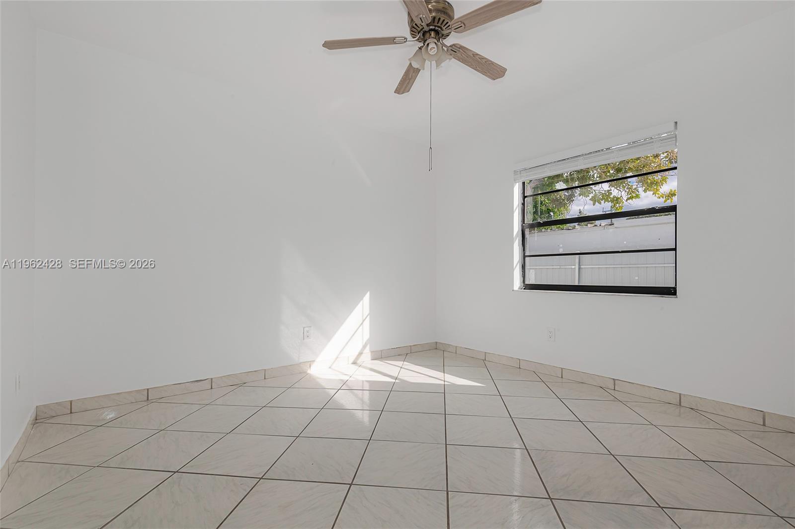 11941 Southwest 178th Terrace Miami, FL 33177 - Photo 19 of 33 a view of an empty room