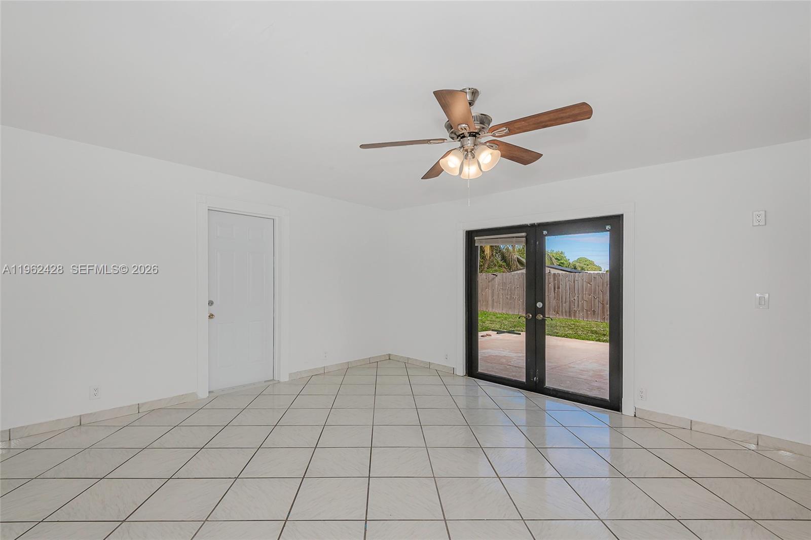 11941 Southwest 178th Terrace Miami, FL 33177 - Photo 22 of 33 a view of an empty room and window