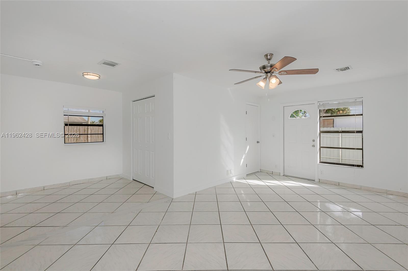 11941 Southwest 178th Terrace Miami, FL 33177 - Photo 25 of 33 a view of an empty room and window