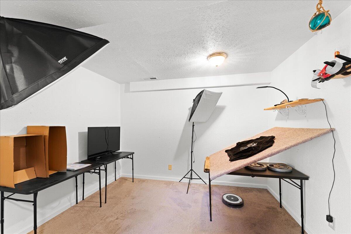 4093 Old Upton Road Central Point, OR 97502 - Photo 12 of 23 a view of a room with gym equipment