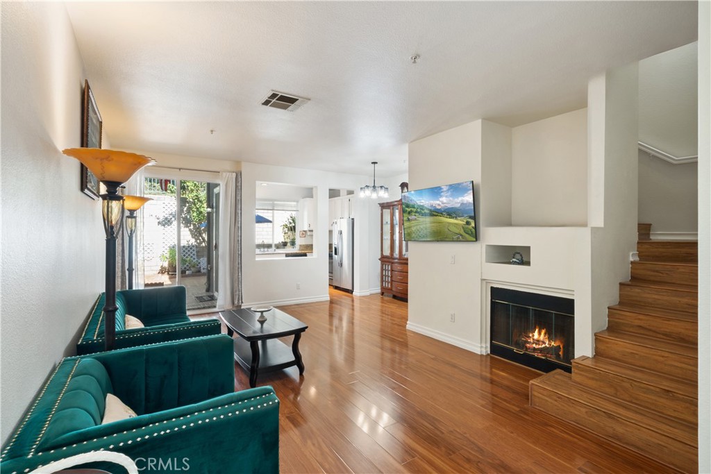 1517 Ismail Place Placentia, CA 92870 - Photo 3 of 28 a living room with furniture and a fireplace