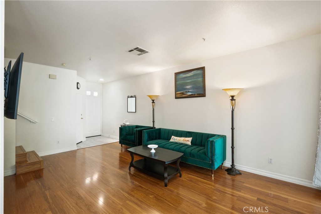 1517 Ismail Place Placentia, CA 92870 - Photo 5 of 28 a living room with furniture and a flat screen tv