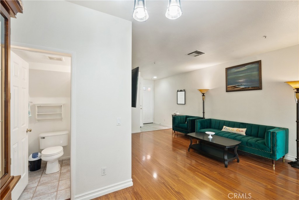 1517 Ismail Place Placentia, CA 92870 - Photo 6 of 28 a living room with furniture and a wooden floor