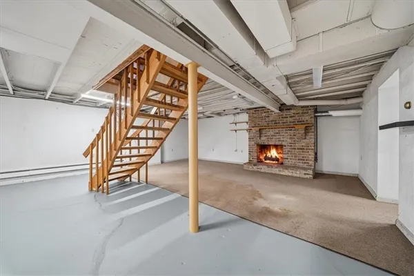 a view of an empty room with stairs