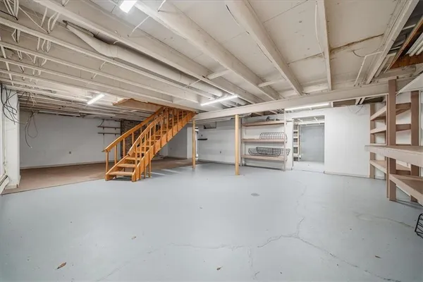a view of an empty room with a utility room