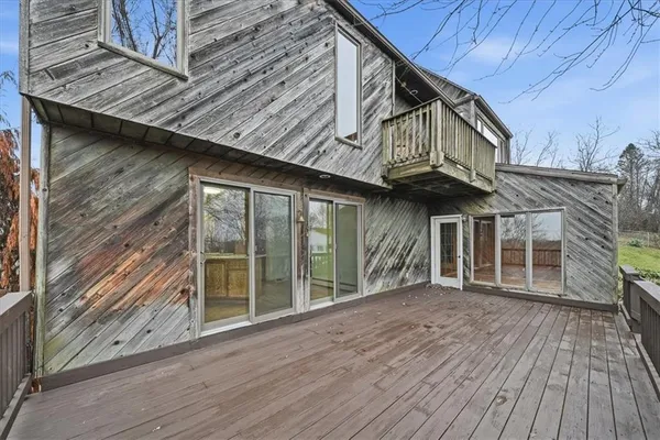 a view of a house with a balcony