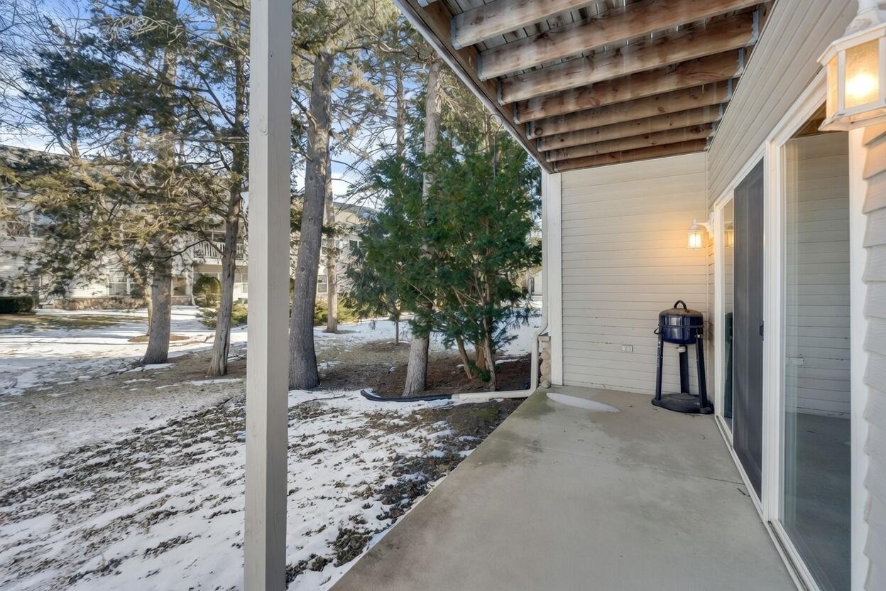 173 Heidel Road Thiensville, WI 53092 - Photo 26 of 34 Covered Patio Overlooking Courtyard