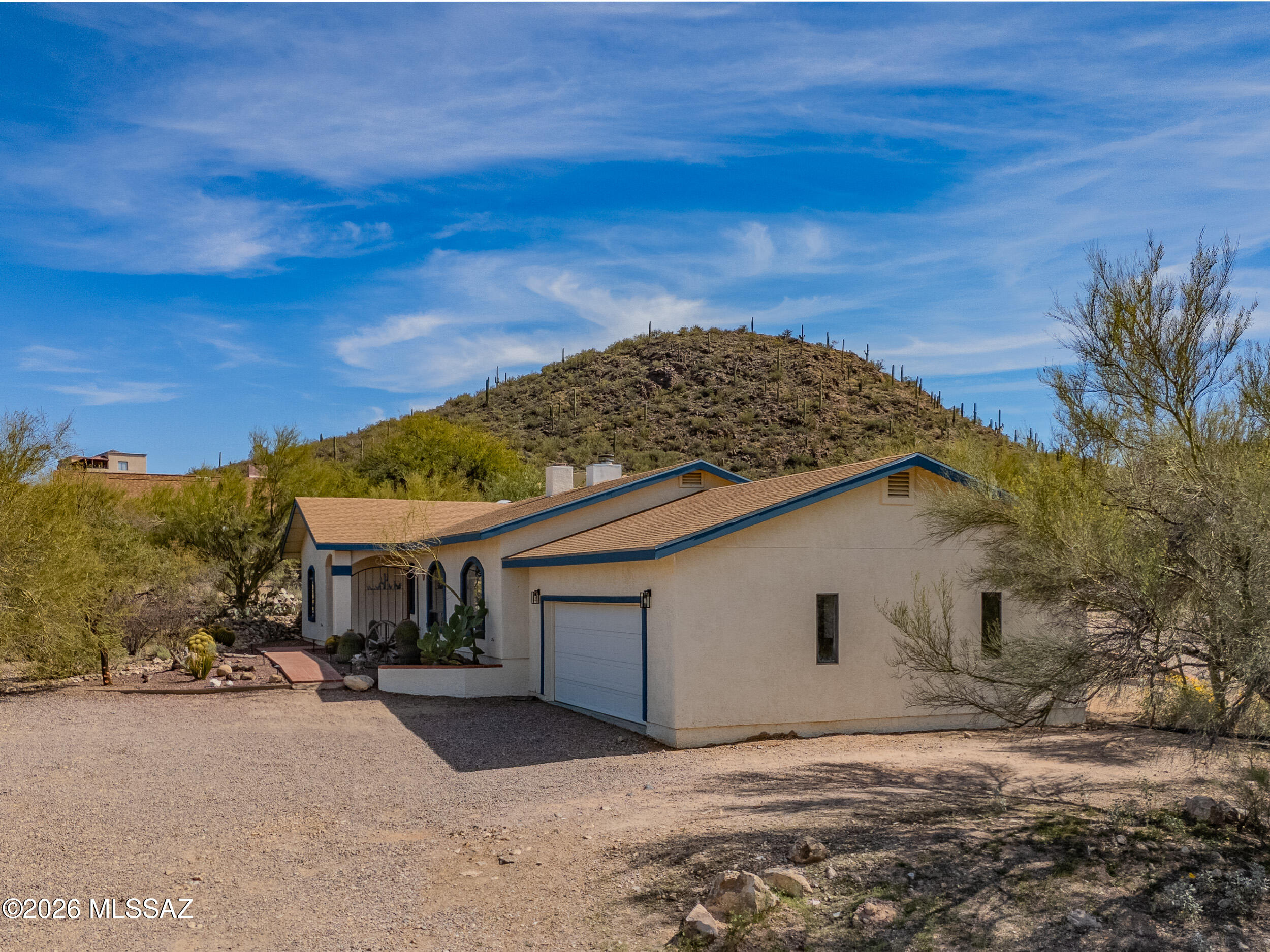 4155 West Coyote Ridge Trail Tucson, AZ 85746 - Photo 5 of 39 a view of a house with a yard